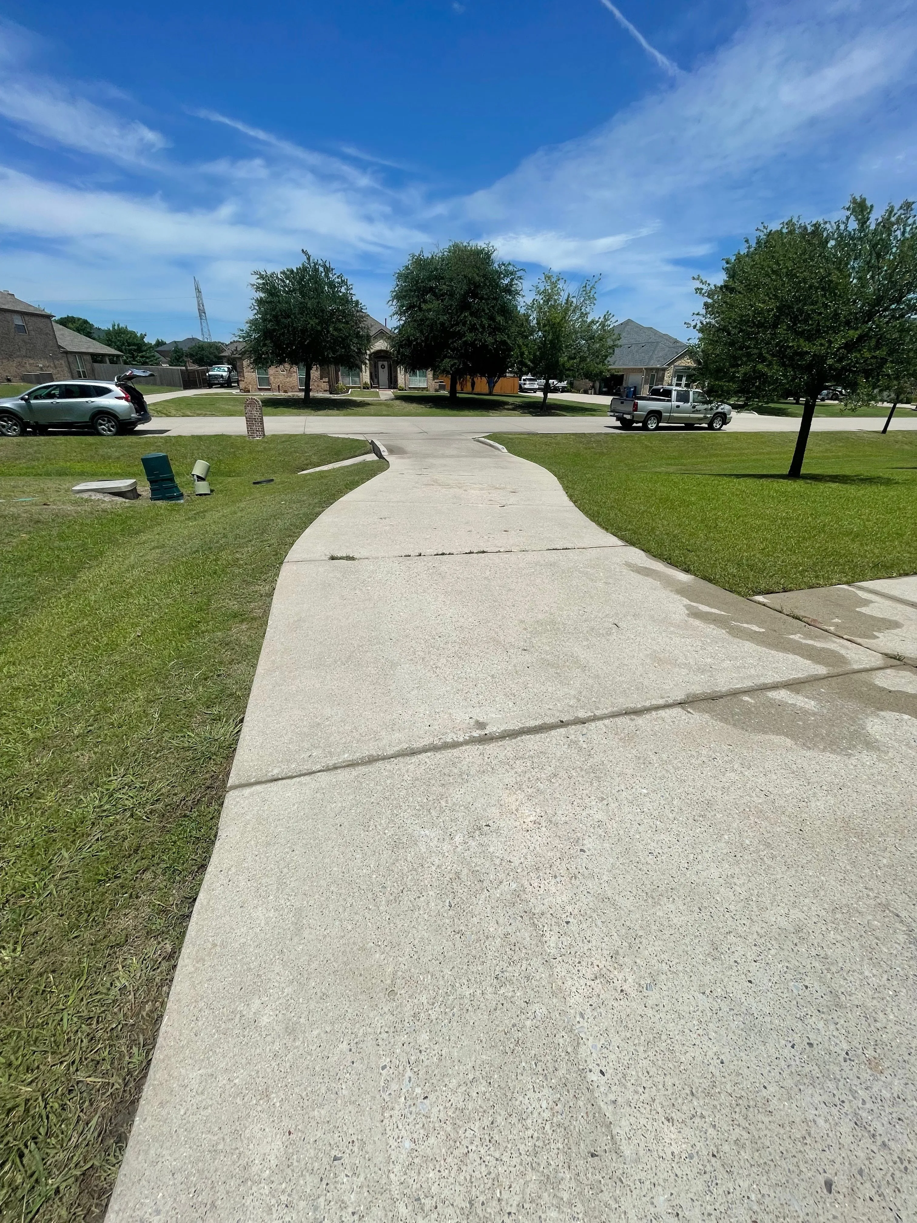 The same Wylie, TX driveway cleaned bright and even after pressure washing
